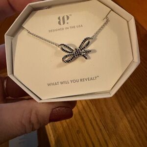 Elegant Rhodium Bow Necklace with black onyx